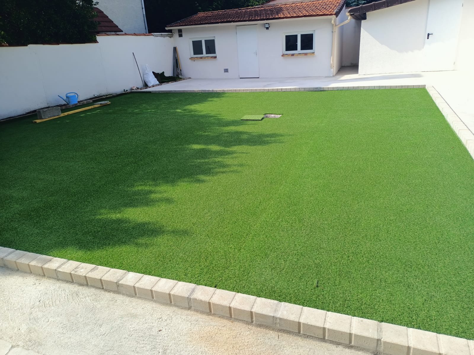 Pose gazon synthétique à Île-de-France