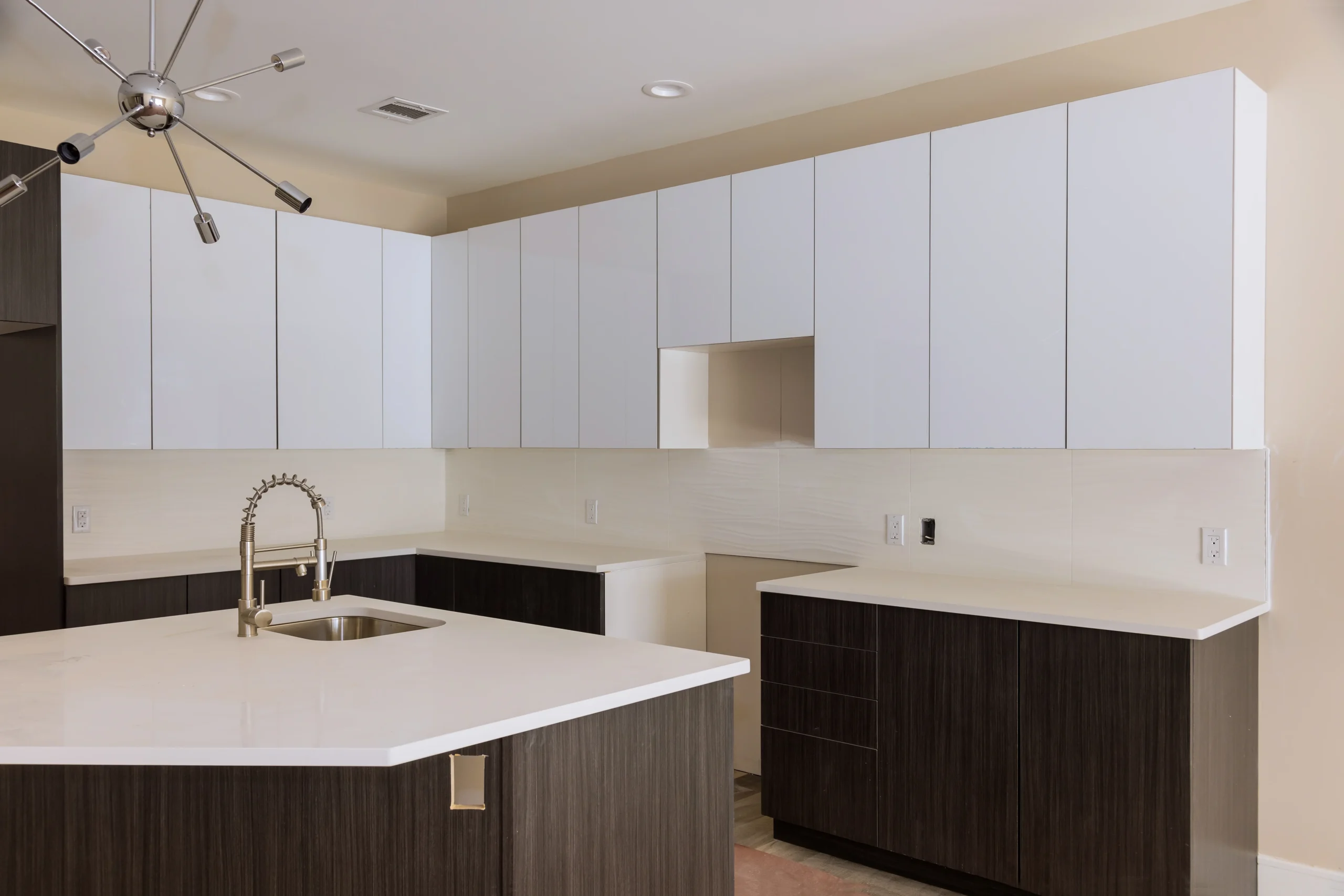 installing-new-sink-tap-in-modern-kitchen-cabinet-2026-03-25-00-37-44-utc